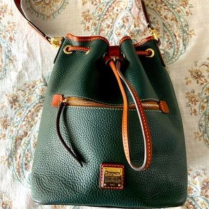 Dooney & Burke Pebble Leather Drawstring purse.  Used once very good condition.